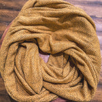 This matching human and pet infinity scarf set will keep you (and your pet!) warm and stylish this winter. The scarf set includes an infinity scarf for owner and a small scarf for pet.  The owner's scarf has a circumference of approximately 72 inches. This can be worn as a single loop or a double loop. This matching set is perfect for a photo shoot and makes a great dog mom gift.